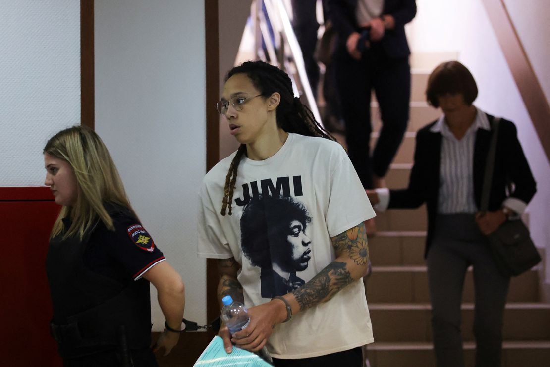 Griner is escorted by a guard before a court hearing on July 1. 