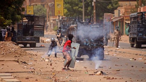 A Sudanese anti-coup protester clashes with security forces during a demonstration against military rule, in Khartoum on June 30, 2022. 