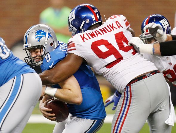 <strong>Mathias Kiwanuka </strong>-- The <a href="index.php?page=&url=https%3A%2F%2Fbleacherreport.com%2Farticles%2F186819-mathias-kiwanuka-a-bio-on-the-ugandan-giant%23%3A%7E%3Atext%3DHis%2520grandfather%2520Benedicto%2520Kiwanuka%2520was%2Cgovernment%2520on%2520March%25201%252C%25201962." target="_blank" target="_blank">grandson</a> of Uganda's first prime minister, Kiwanuka (pictured here making a tackle against the Detroit Lions in 2013) is another two-time Super Bowl champion with the New York Giants, and, along with Umenyiora, is one of the former players traveling to Africa for the NFL.