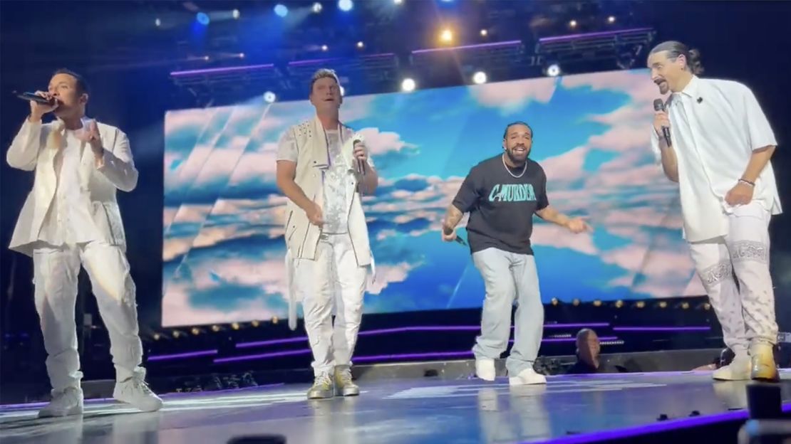 (From left) Howie Dorough, Nick Carter, special guest Drake and Kevin Richardson perform during a Backstreet Boys concert in Toronto for the group's DNA World Tour. 