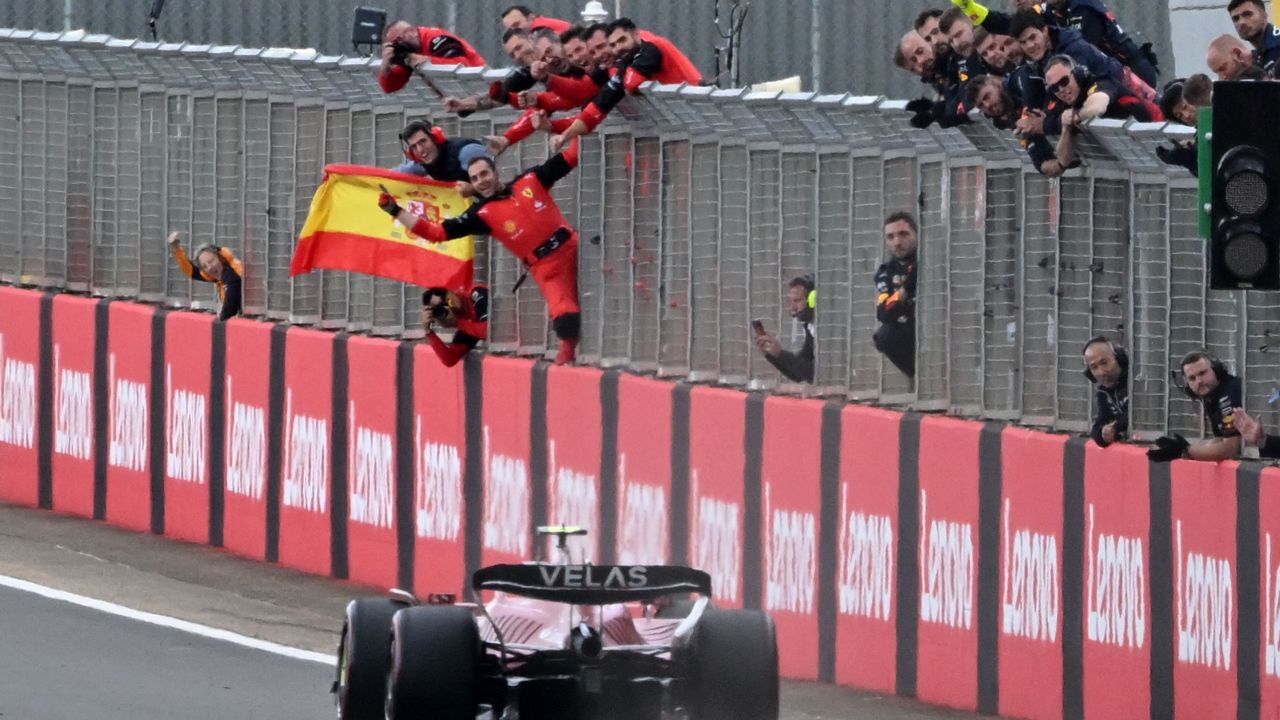 Sainz crosses the finish line first to win the British Grand Prix.