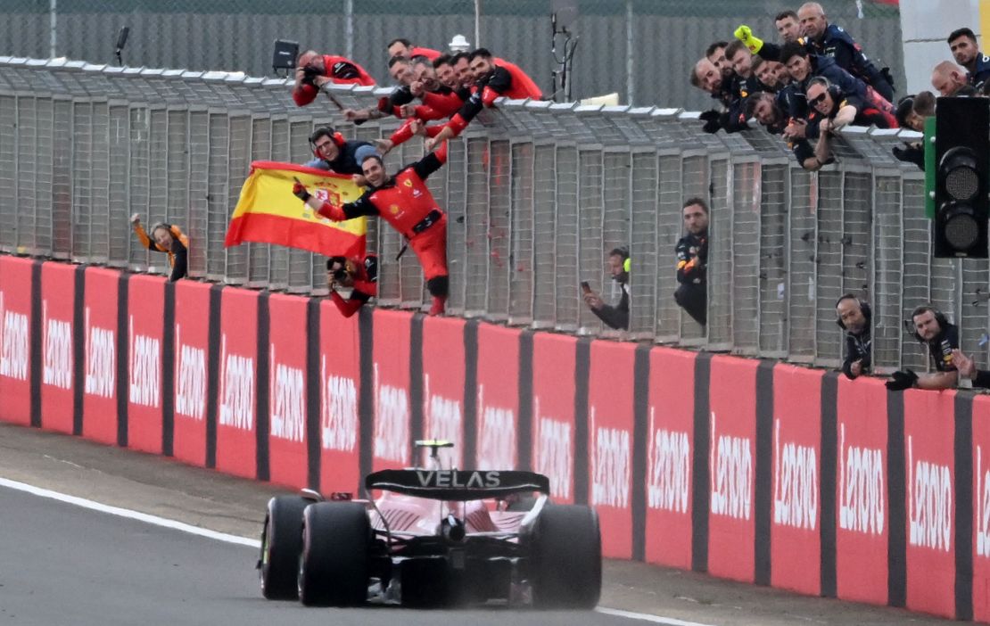 Sainz crosses the finish line first to win the British Grand Prix.