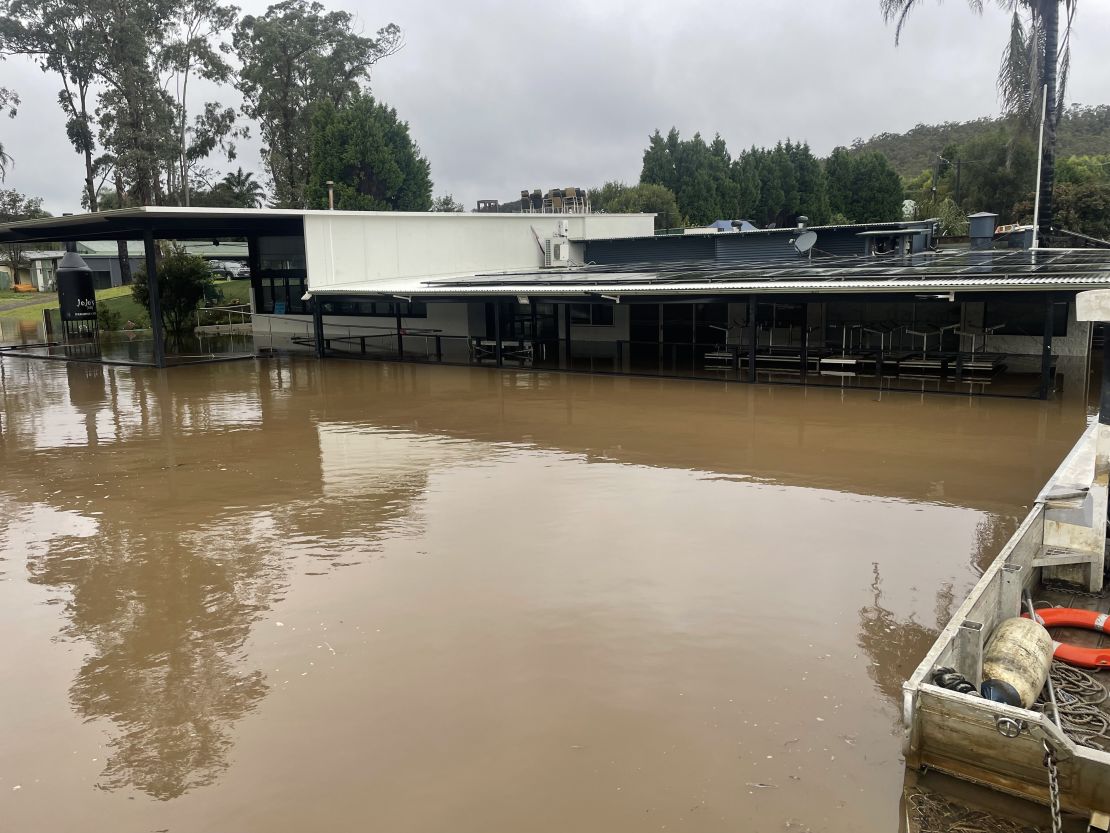 Darren Osmotherly's Paradise Café in Lower Portland, NSW, has flooded four times in 18 months.