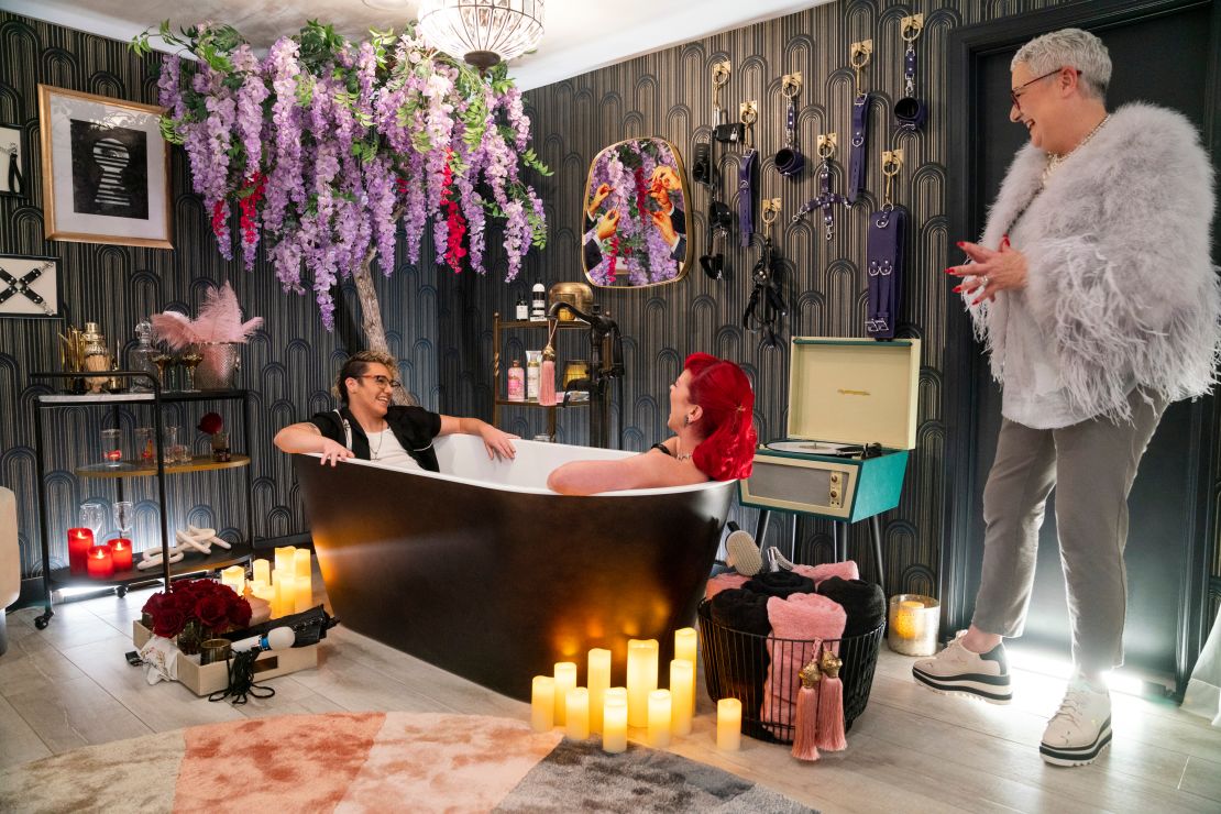 (From left) Couple Brodie and Bettie are shown with interior designer Melanie Rose in a scene from "How To Build a Sex Room."