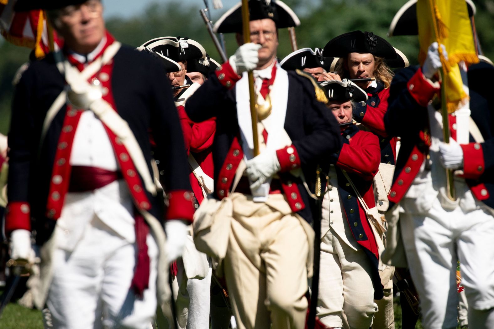 War re-enactors participate in Independence Day celebrations at George Washington's residence in Mount Vernon, Virginia, on Monday.