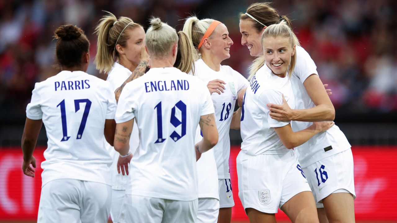 Jill Scott celebrates after scoring England's fourth goal during its win over Switzerland.