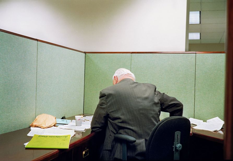 A man at work at a commercial bank.