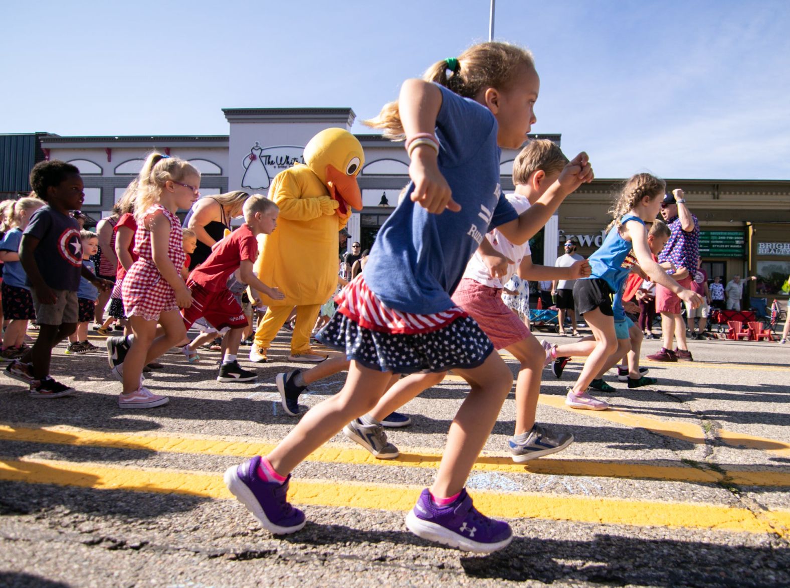 A younger wave of participants in the Duckling Dash during Fourth of July celebrations in Livingston, Michigan, Monday.