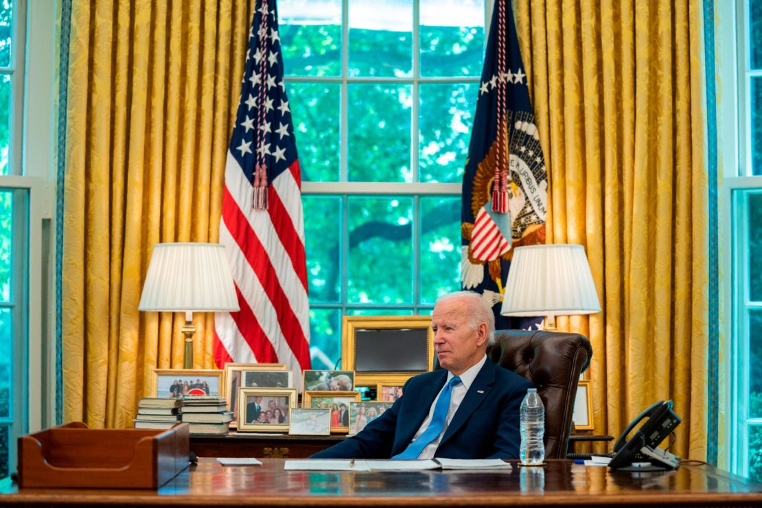 President Joe Biden listens to a question during an interview with the Associated Press in the Oval Office of the White House, June 16, 2022.