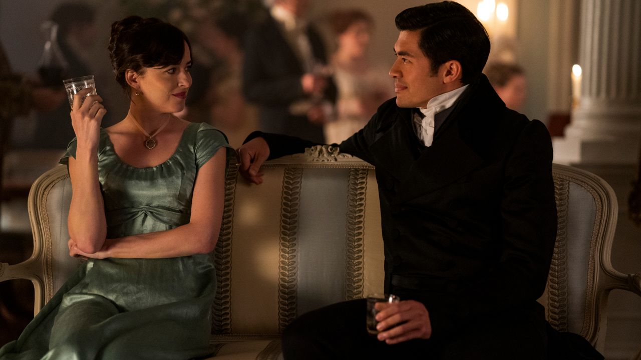 Dakota Johnson as Anne Elliot, Henry Golding as Mr. Elliot in "Persuasion."