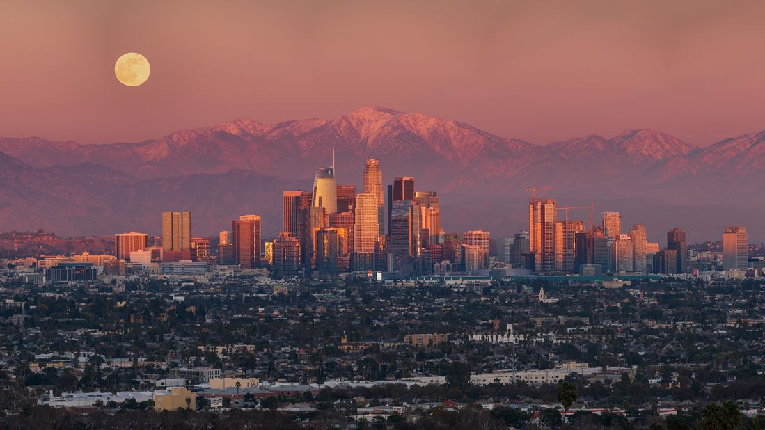 Sean Goebel snapped the distinctive Los Angeles skyline in alignment with the moon after a winter storm in December 2021. 