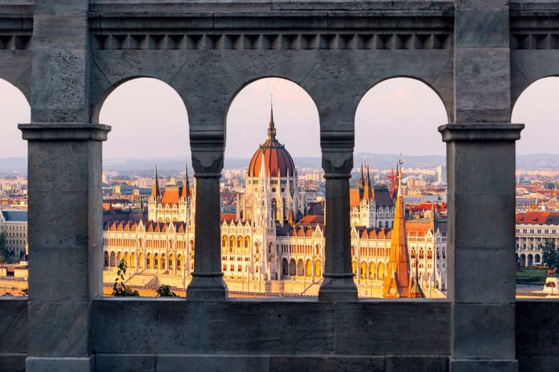The Hungarian Parliament is seen through the arches of Fisherman's Bastion in Budapest. The CDC warns against travel to places where the Covid-19 risk is "unknown."