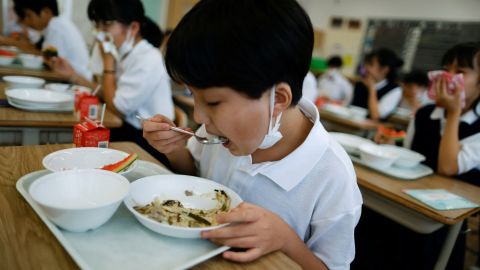 A student eats lunch at Senju Aoba Junior High School in Tokyo, Japan, on June 29.