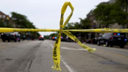 Police tape hangs at corner of Central Avenue and Green Bay Rd., in Highland Park, Ill., a Chicago suburb, Monday, July 4, 2022, after a mass shooting at Highland Park Fourth of July parade. (AP Photo/Nam Y. Huh)
