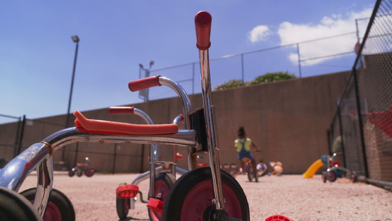 Children play outside at a child care center in Baltimore.