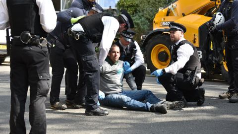 Stott was arrested after climbing on top of an oil tanker.