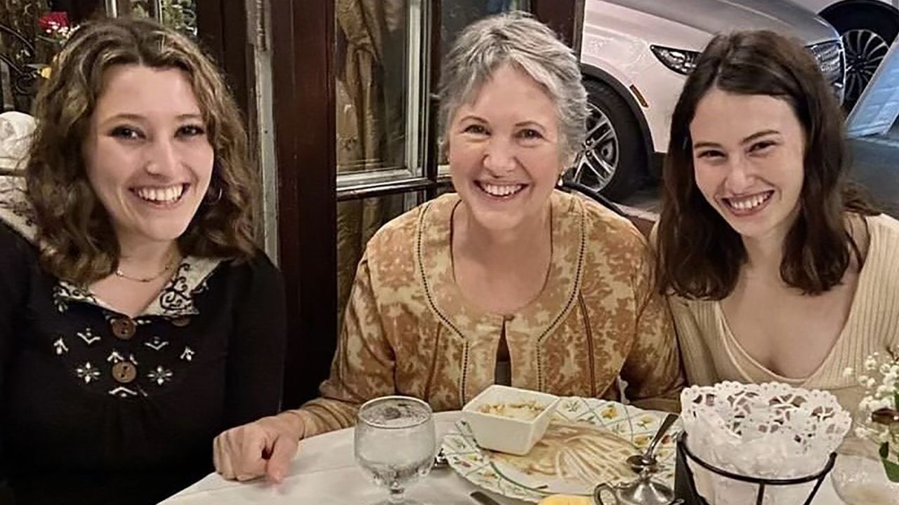 Katherine Goldstein is picured with her daughters Cassie, right, and Alana, left, in Ithaca, New York, for Cassie's graduation.