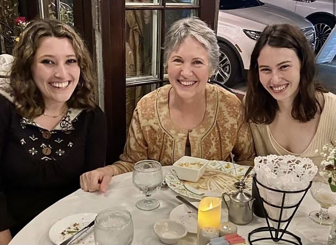 Katherine Goldstein is picured with her daughters Cassie, right, and Alana, left, in Ithaca, New York, for Cassie's graduation.