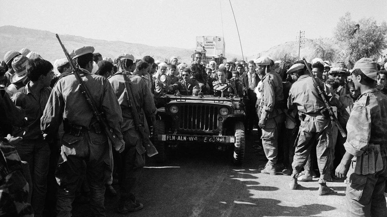 Troops from the National Liberation Army, the armed wing of the National Liberation Front, marching in the district of Medea in Algiers, Algeria, in September 1962.