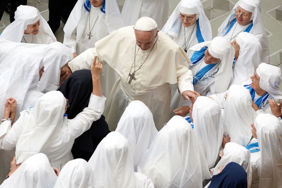 The Pope is greeted by a group of nuns at the Vatican in August 2018.