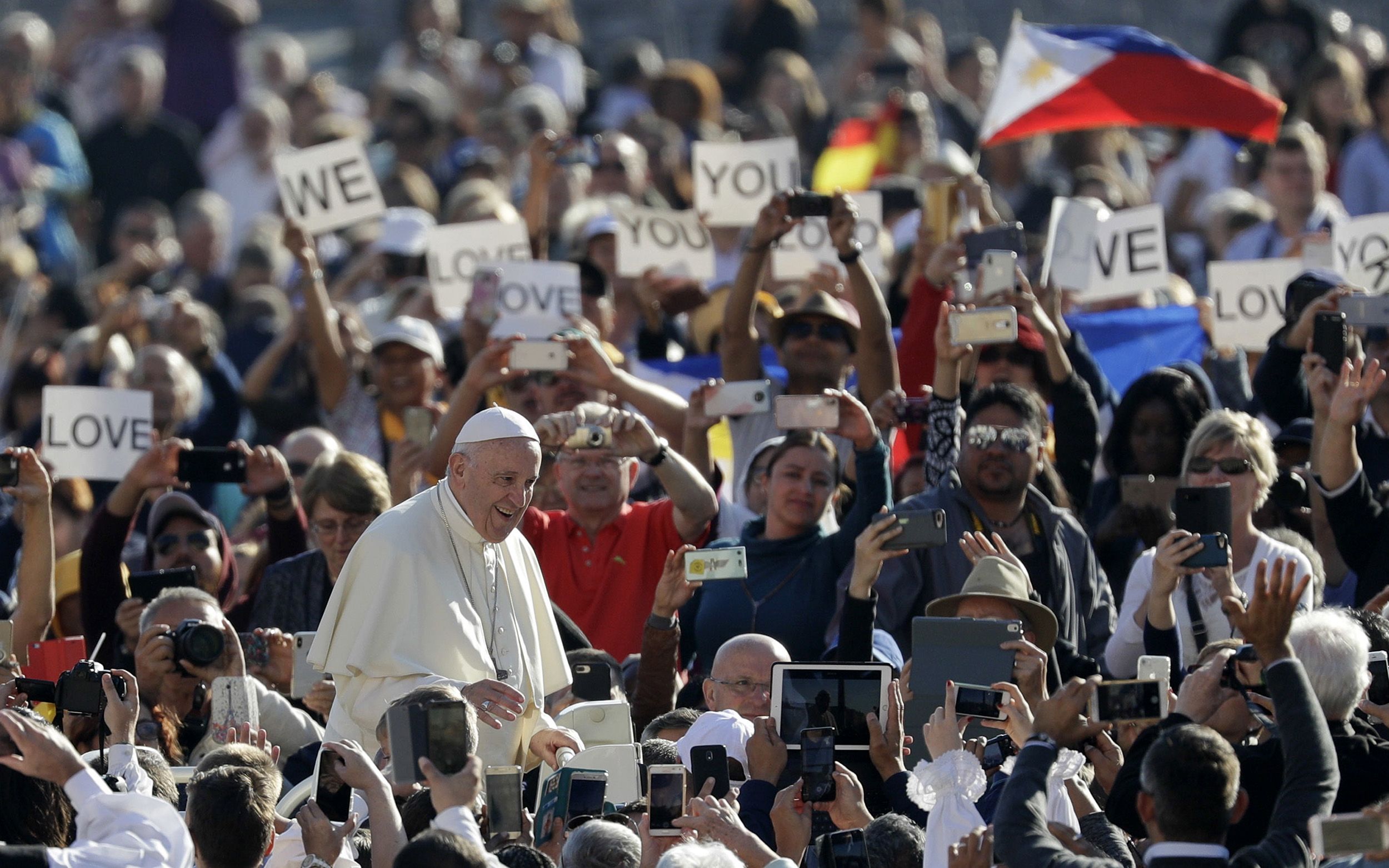 Francis arrives with the 'popemobile' in St. Peter's Square in October 2018.