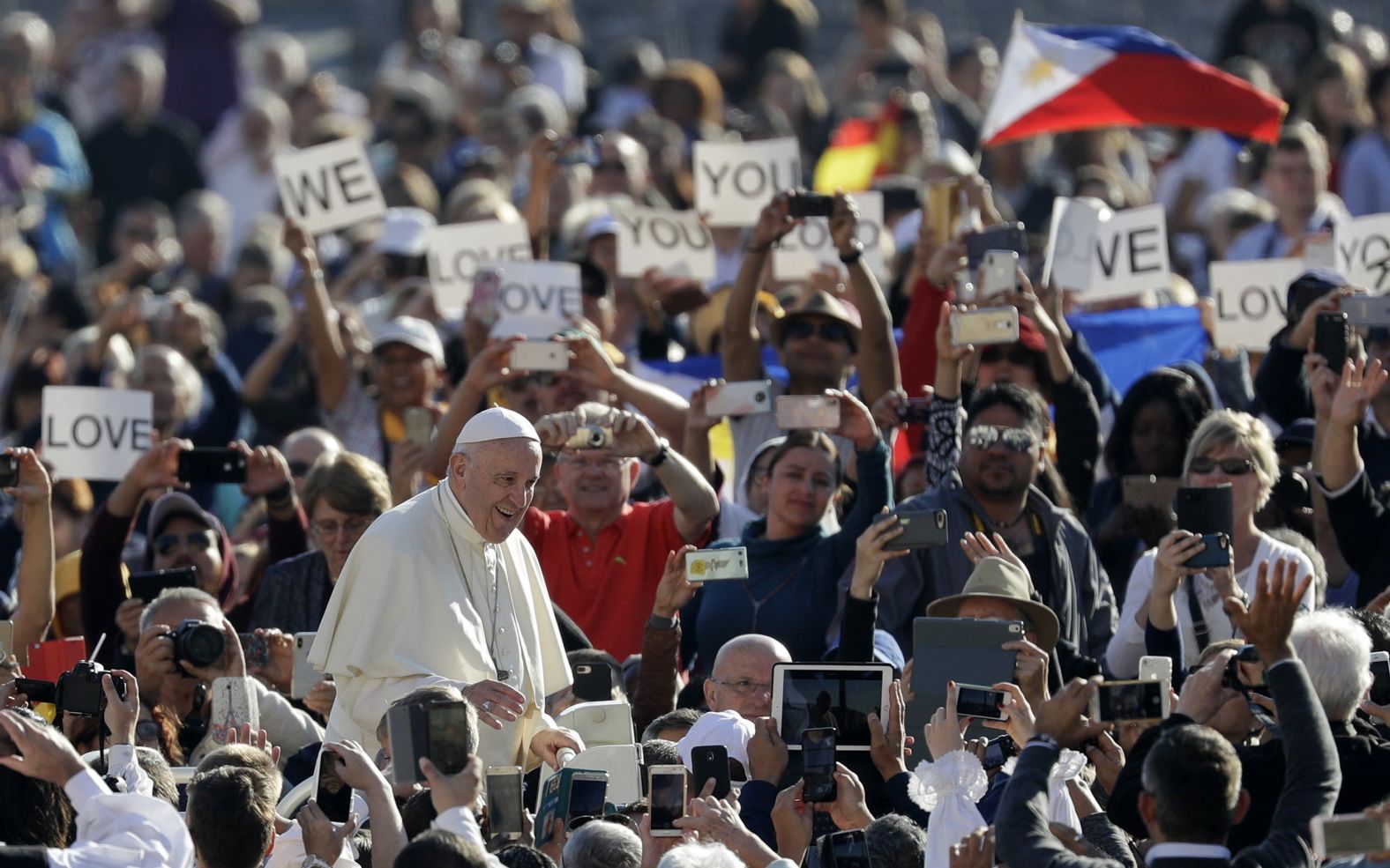 Francis arrives with the "popemobile" in St. Peter's Square in October 2018.