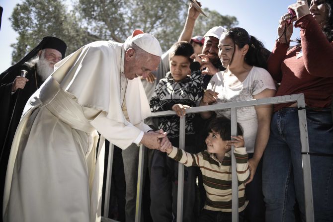The Pope meets migrants at the Moria refugee camp on the Greek island of Lesbos in April 2016. He received an emotional welcome <a href="index.php?page=&url=http%3A%2F%2Fwww.cnn.com%2F2016%2F04%2F16%2Feurope%2Fpope-visits-refugees-lesbos%2F" target="_blank">during a visit</a> in which he showed solidarity with migrants fleeing war and poverty. 