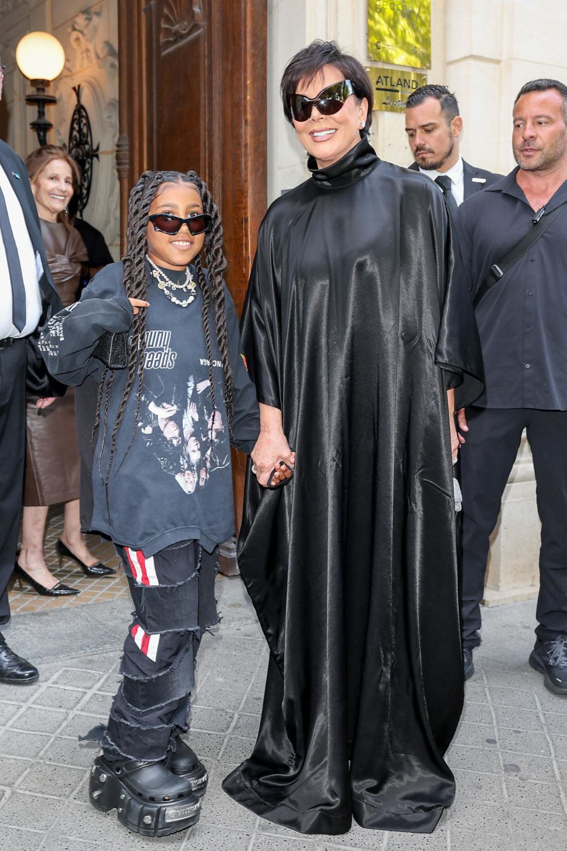 North West and Kris Jenner outside the Balenciaga haute couture show in Paris. 