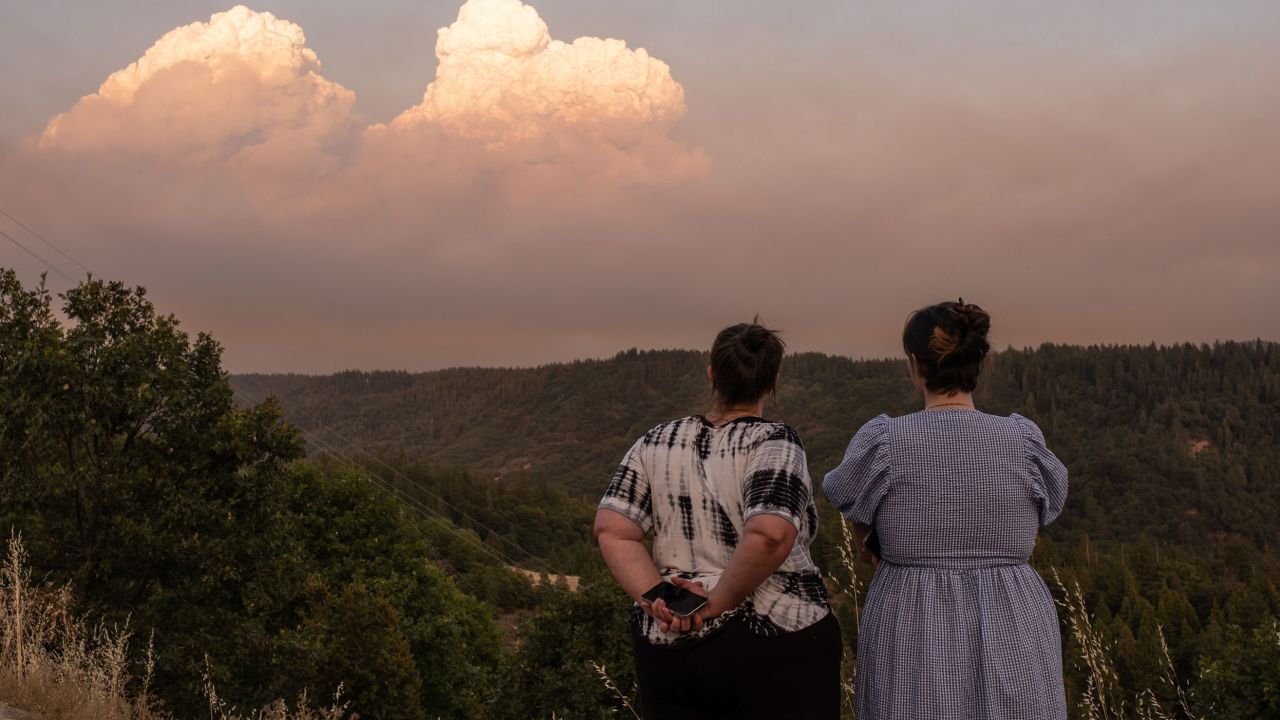 Residents of El Dorado County, California, watch the smoke plume from the Caldor Fire in 2021.