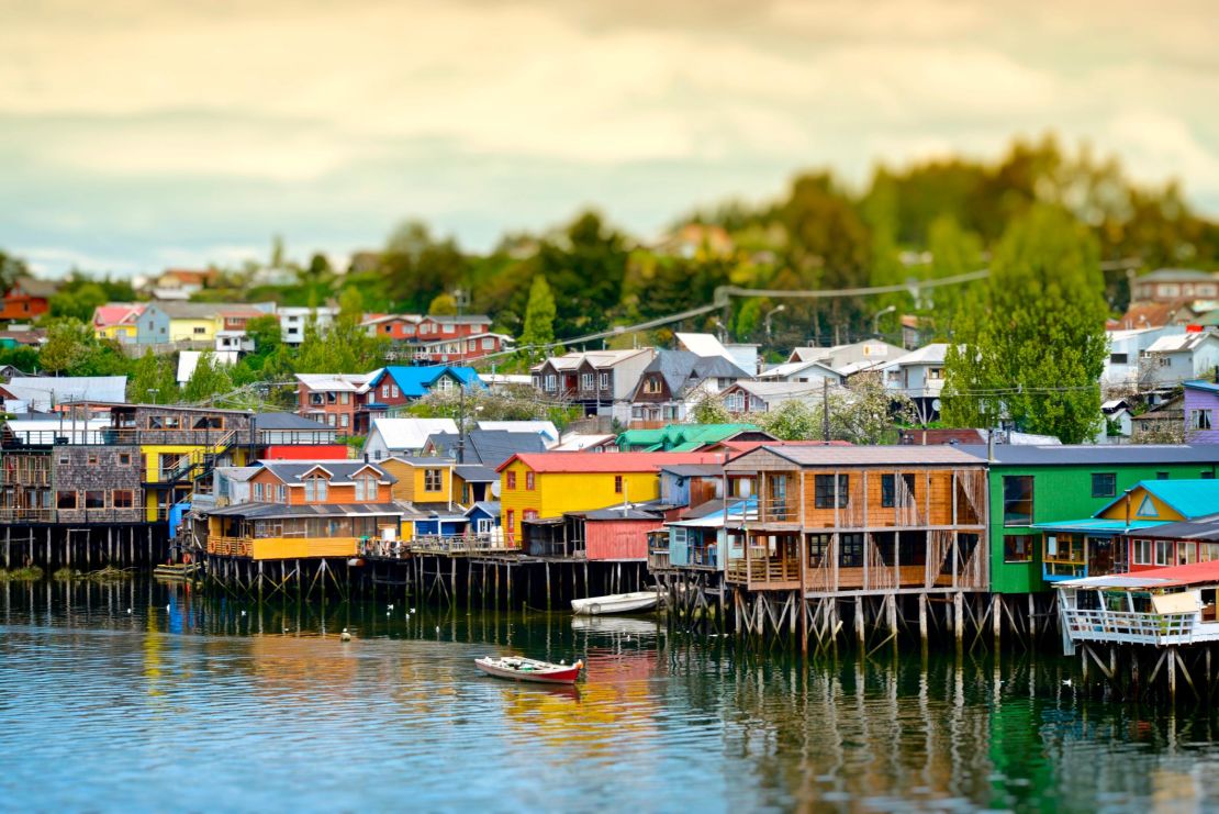 The colorful houses on the water, known as palafitos, in the town of Castro on Island of Chiloé, Chile.