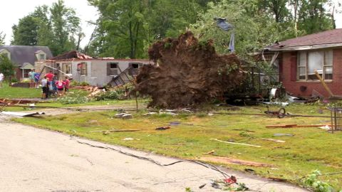 An uprooted tree in Goshen Township, Ohio, after a possible tornado ripped through the area Wednesday.