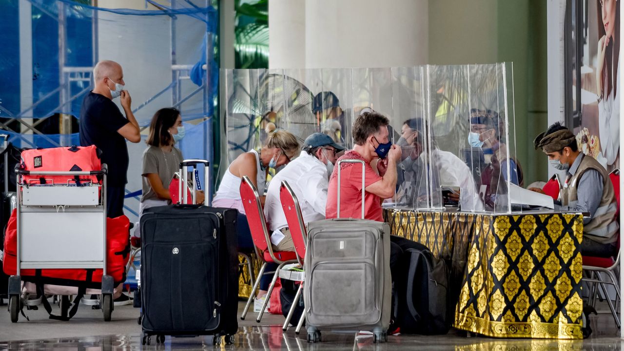 International travellers at Ngurah Rai International Airport in Bali, Indonesia, March 7, 2022.