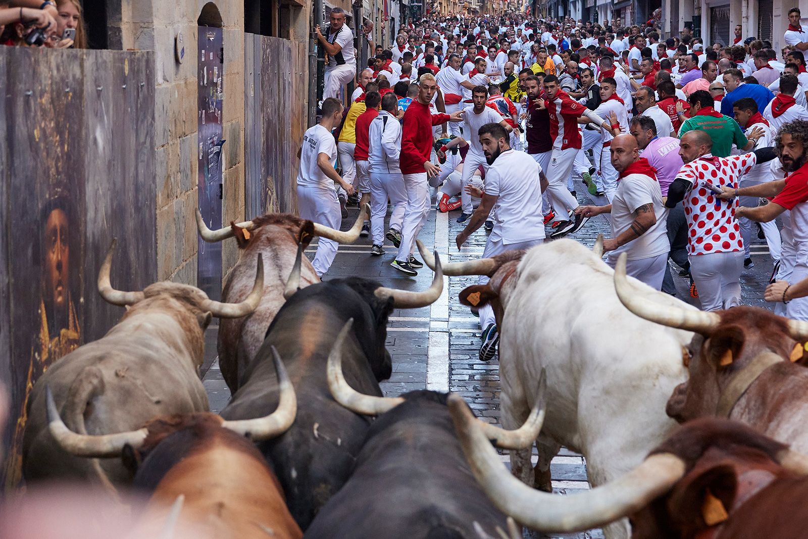 Thousands take part in first running of the bulls in Spain's San