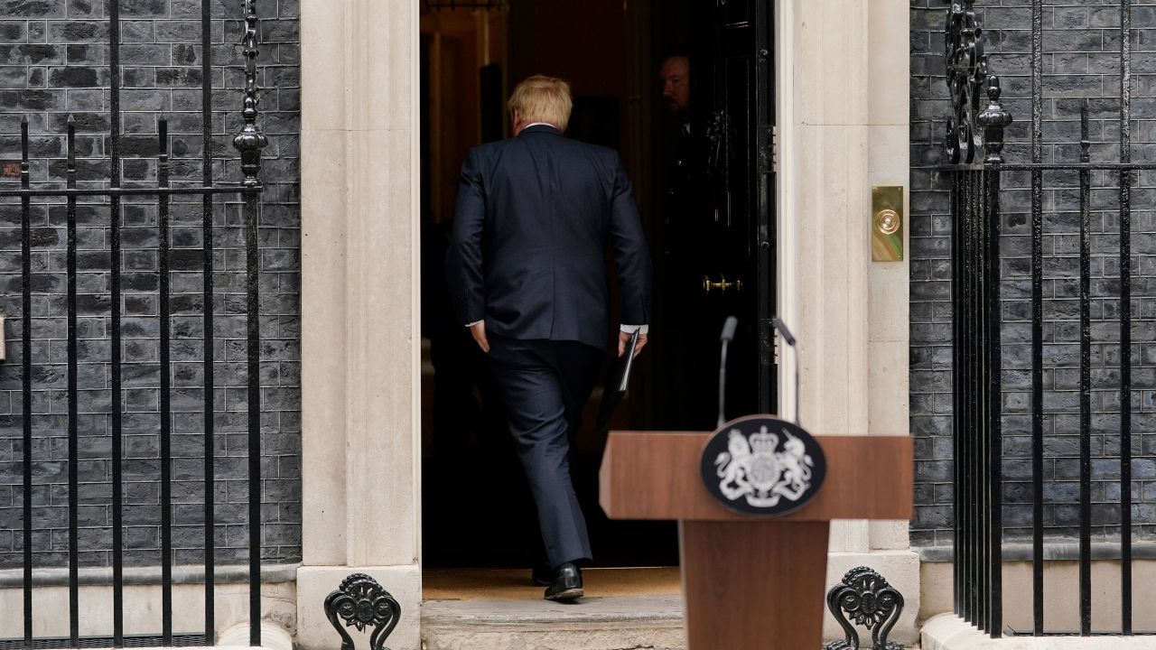 Johnson enters 10 Downing Street after reading a statement on July 7, 2022.