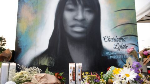 Flowers and candles are pictured at a makeshift memorial during a vigil on the third anniversary of the death of Charleena Lyles who was shot and killed by Seattle police.