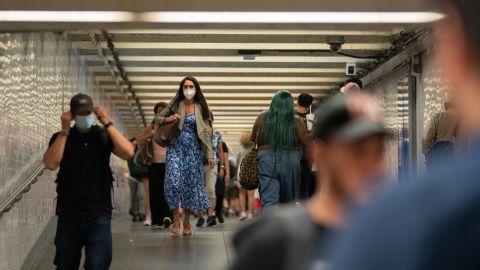 Some commuters put on masks in New York's Times Square subway station last week. 