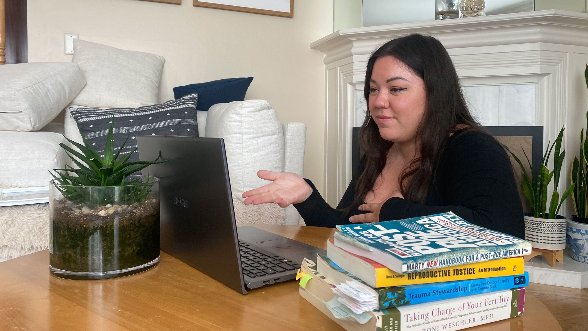 Most clinics don't allow companions or doulas during the pandemic, so Siobhan Diores meets with a client on Zoom before their appointment to calm any nerves and set expectations for the procedure. 