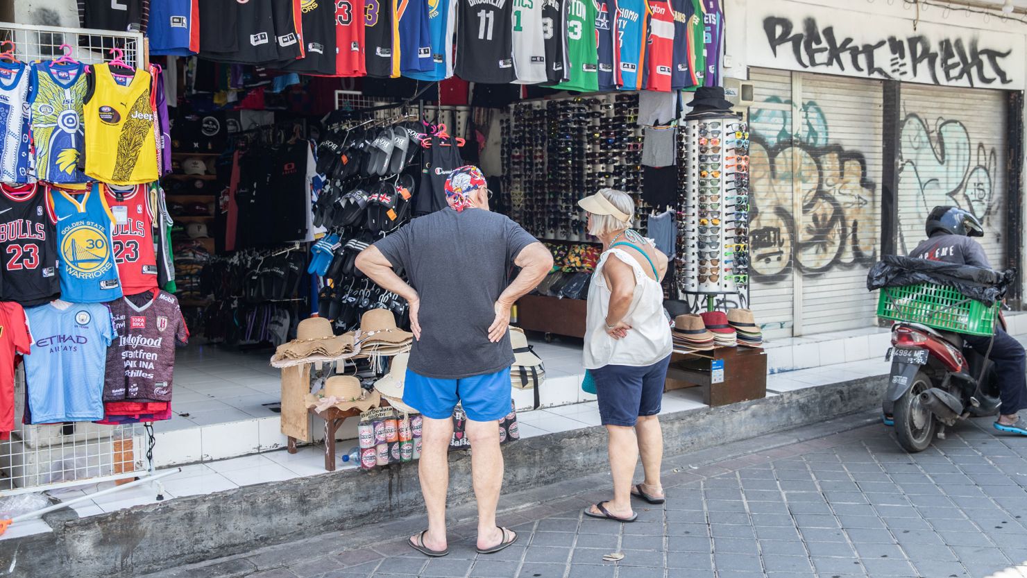 Tourists outside a store in Kuta, Bali, Indonesia, on Friday, May 6, 2022.