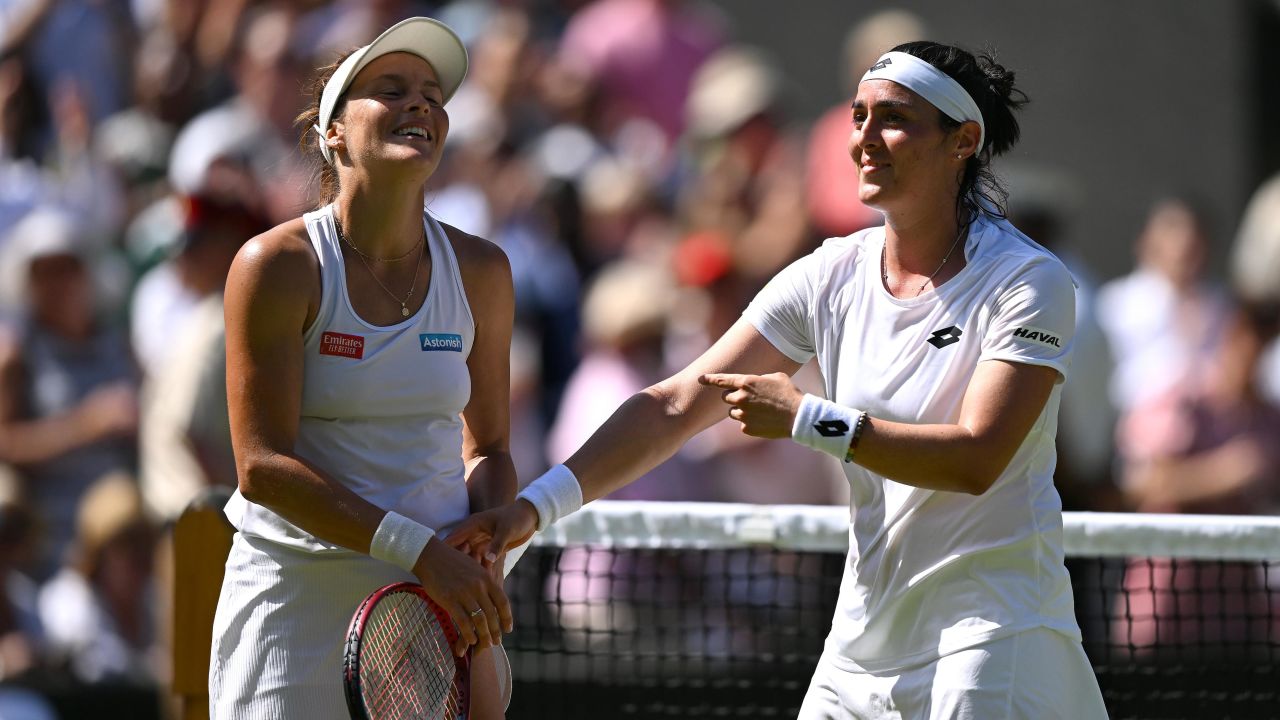 Jabeur (right) and Maria take in the applause after their Wimbledon semifinal. 