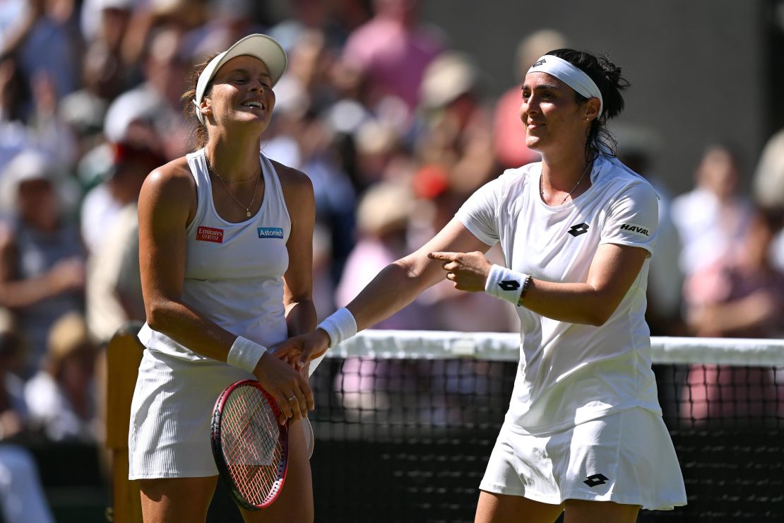 Jabeur (right) and Maria take in the applause after their Wimbledon semifinal. 