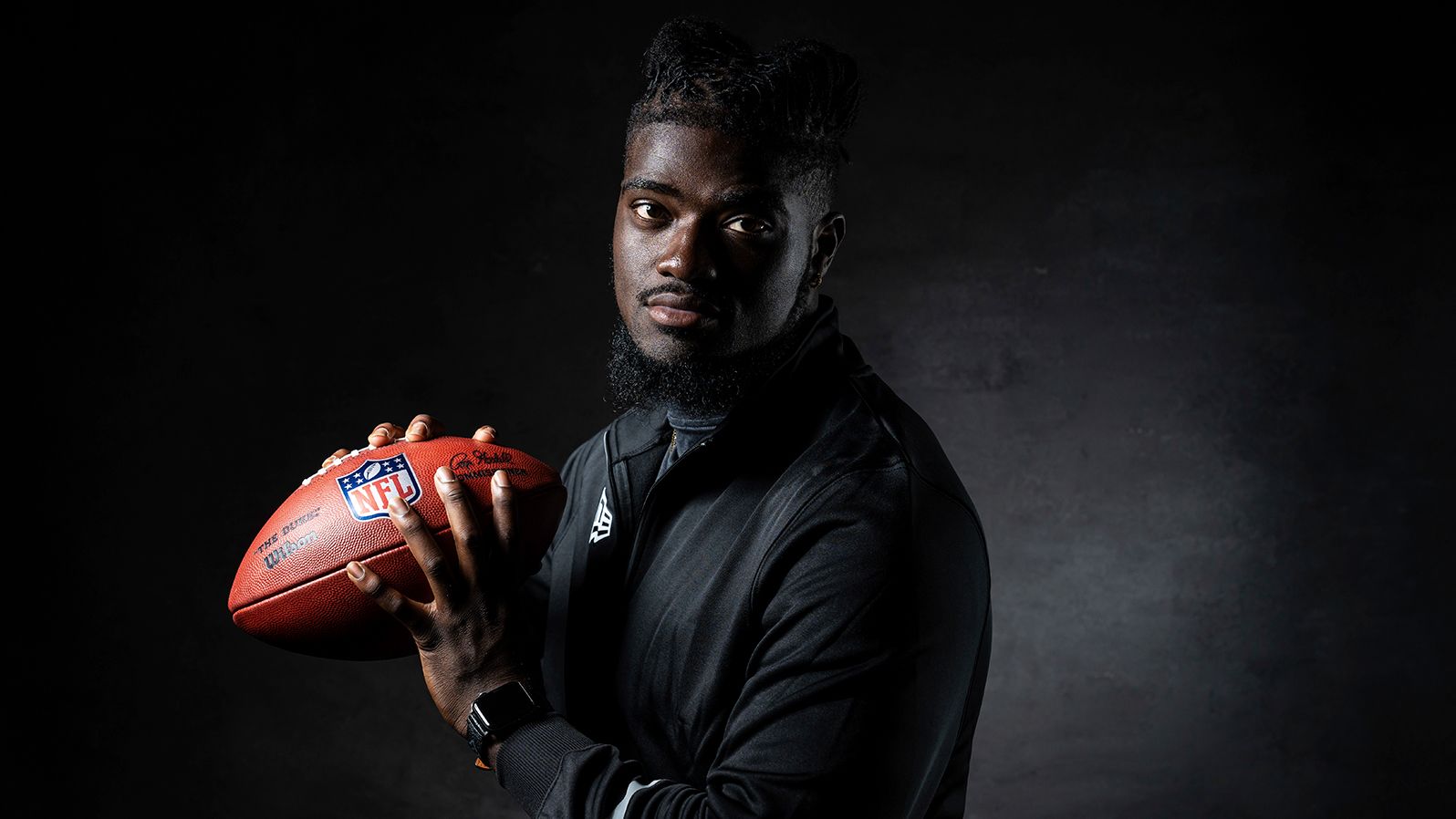 Ojabo poses for a portrait during the NFL Scouting Combine.