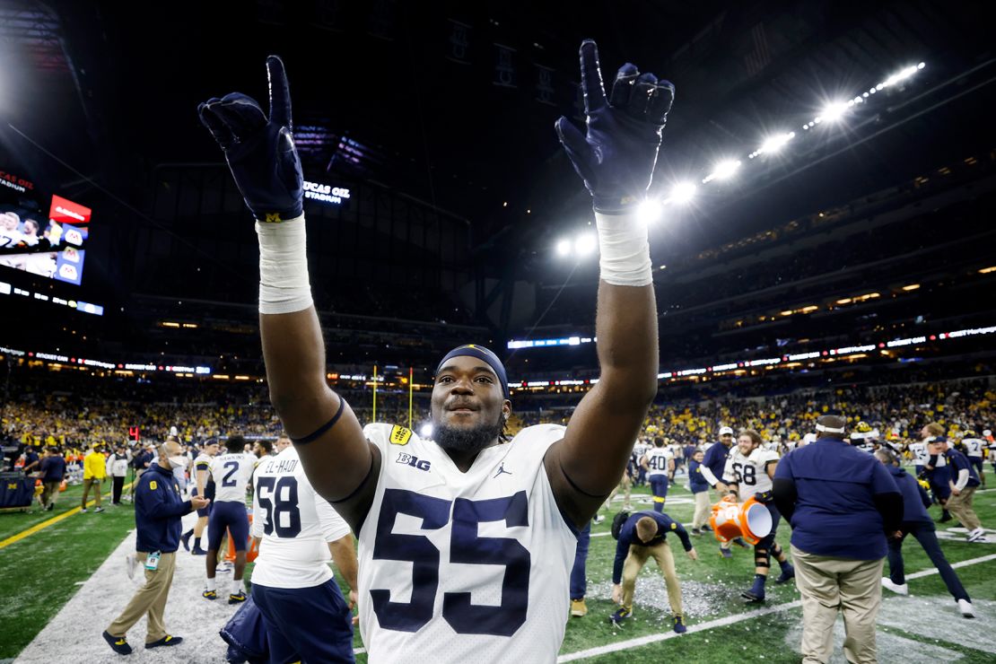 Ojabo celebrates after beating the Iowa Hawkeyes in the Big Ten Championship.