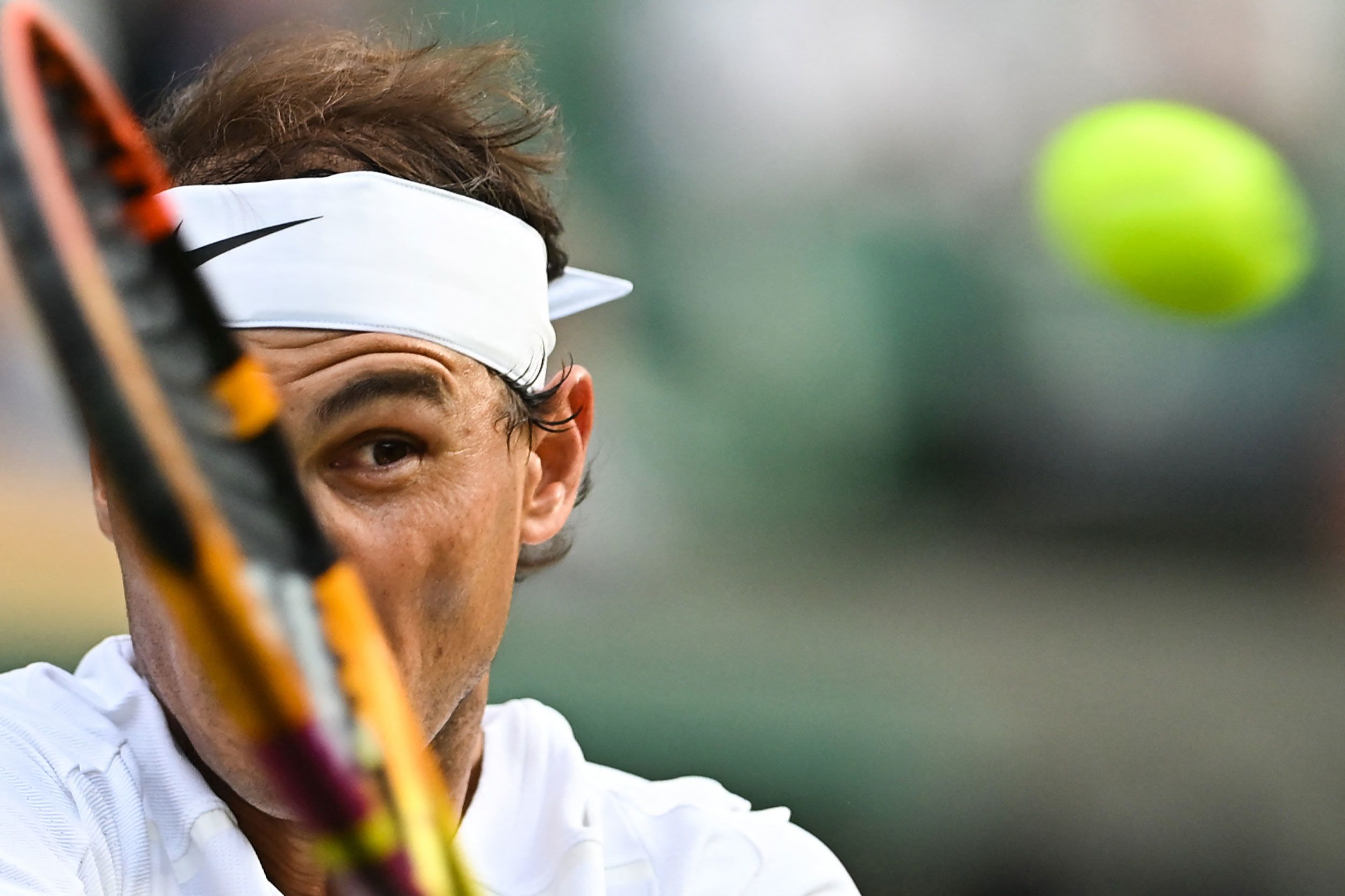 Rafael Nadal returns a shot during a match at Wimbledon on Monday, July 4.