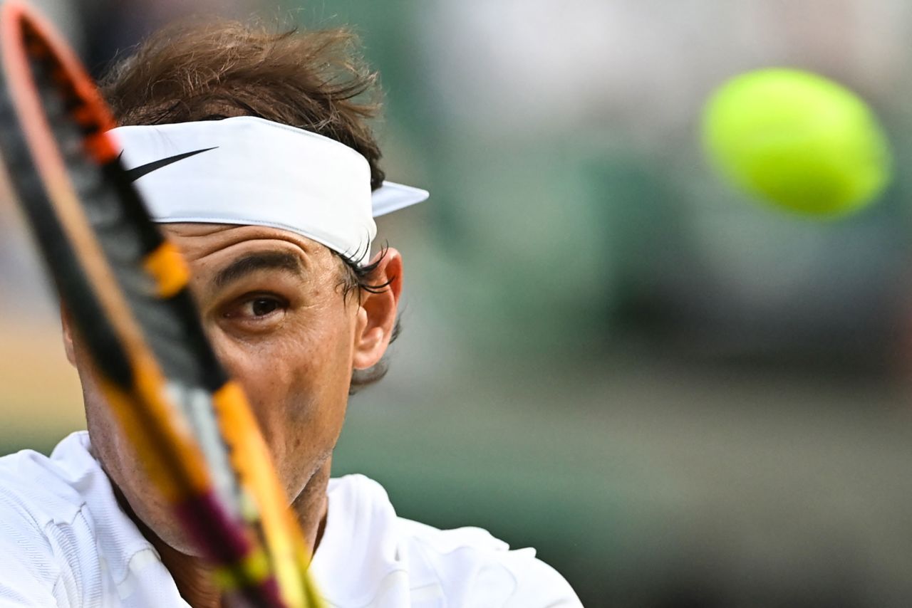 Rafael Nadal returns a shot during a match at Wimbledon on Monday, July 4. Nadal later <a href="https://www.cnn.com/2022/07/07/sport/rafael-nadal-wimbledon-withdraws-injury/index.html" target="_blank">withdrew from the tournament</a> because of injury.