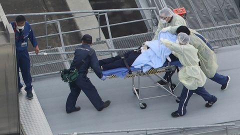 An aerial photo shows a man believed to be former Japanese Prime Minister Shinzo Abe on the stretcher at Nara Medical University Hospital in Kashihara, Nara Prefecture on July 8.