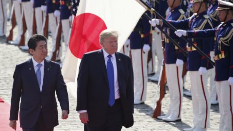 Abe escorts then President Donald Trump during a welcome ceremony at Akasaka Palace, Nov. 6, 2017.