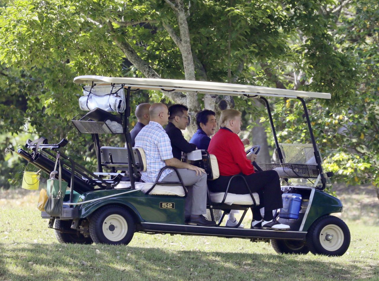 Abe drives Trump in a golf cart as they play a round in Japan's Chiba Prefecture in 2019.