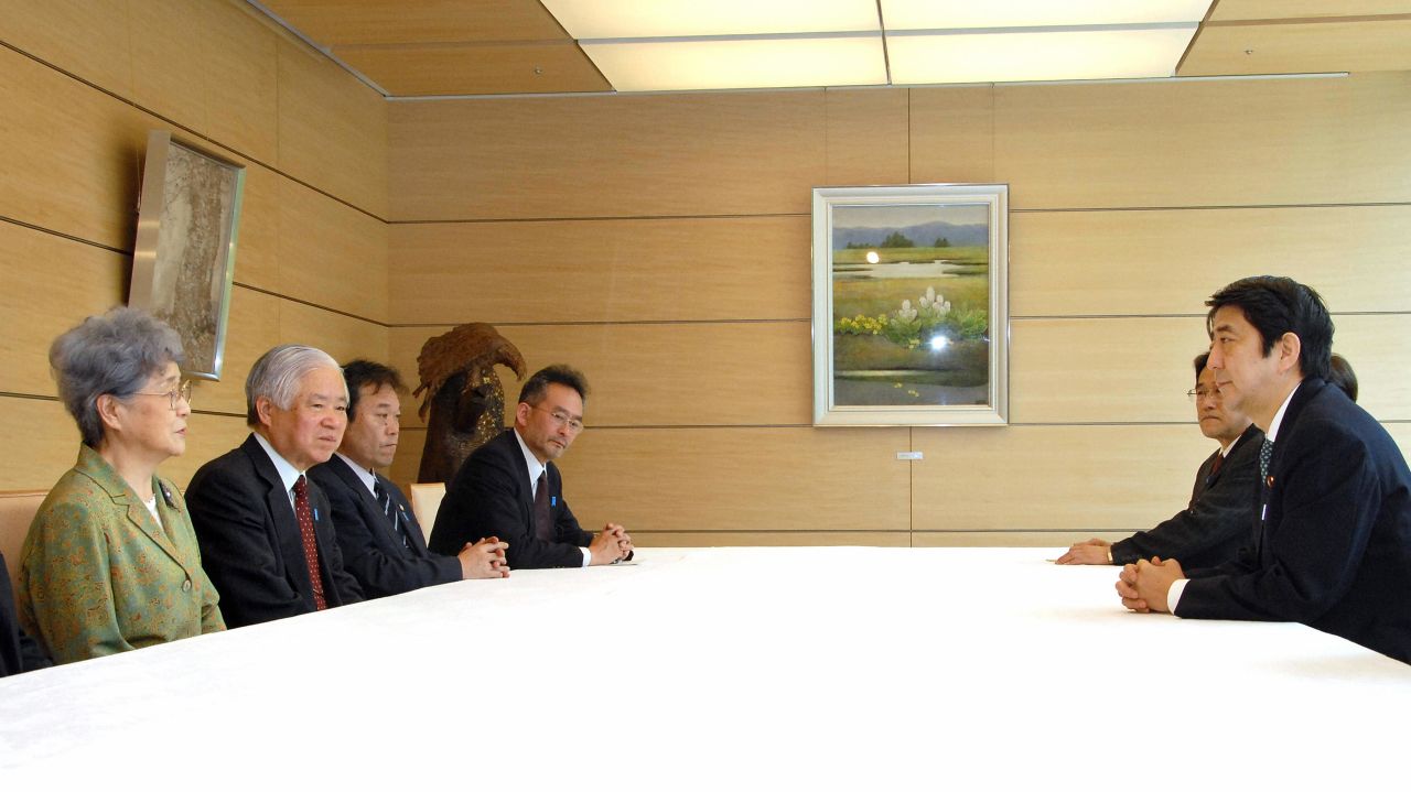 In 2006, Abe meets with Sakie Yokota and her husband, Shigeru, whose daughter Megumi was kidnapped in 1977 by North Korean agents. Megumi's parents were telling Abe about Sakie's meeting with US President George W. Bush.