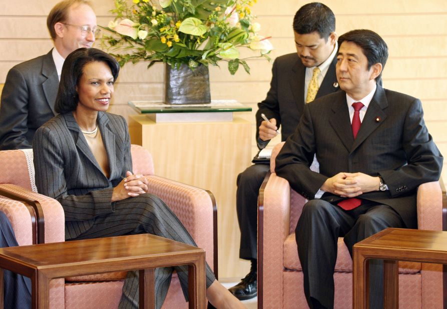 Abe meets US Secretary of State Condoleezza Rice at his office in Tokyo in 2006.