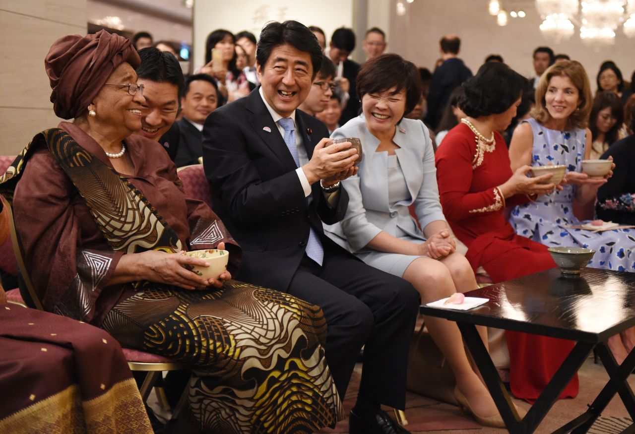 Abe and his wife, Akie, attend a tea ceremony presentation at the World Assembly for Women conference in Tokyo in 2015.